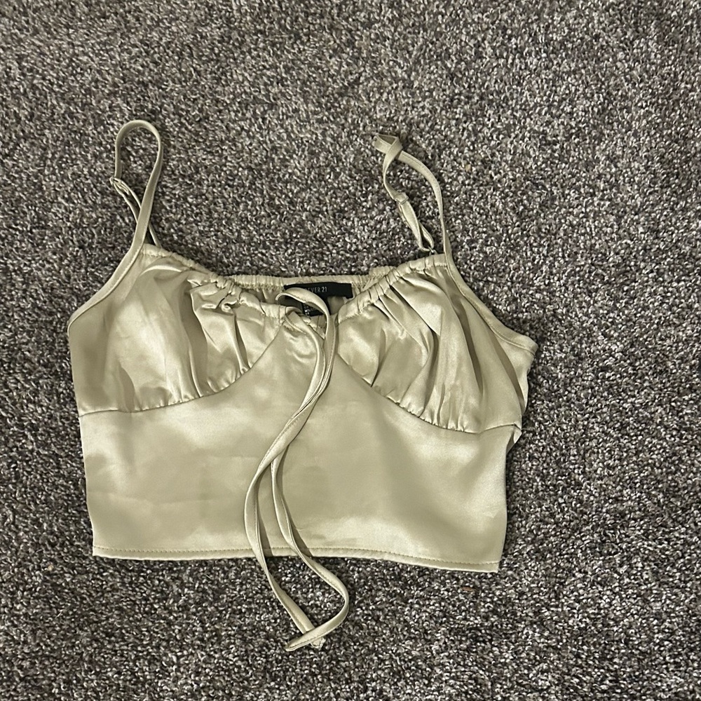 Silky top it scrunches in the back and ties up in the front